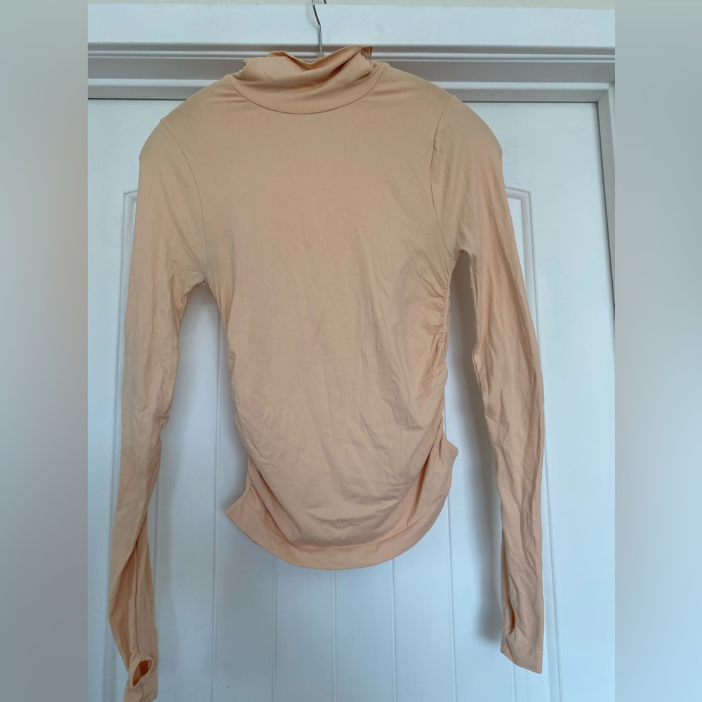 Free People Movement m/l Peach Turtle Neck
